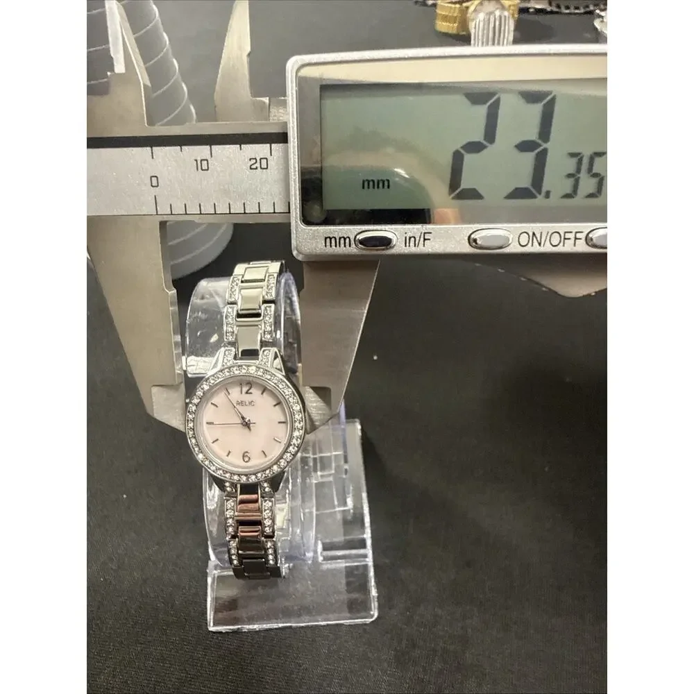 NEW RELIC BY FOSSIL ZR-34571 RUNNING PERFECTLY WITH TAGS STILL ON IT!! (B10)